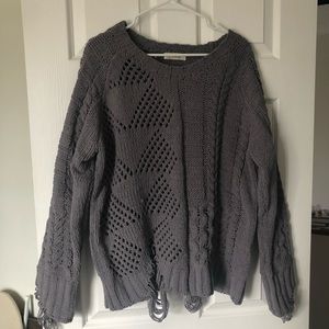 Distressed sweater